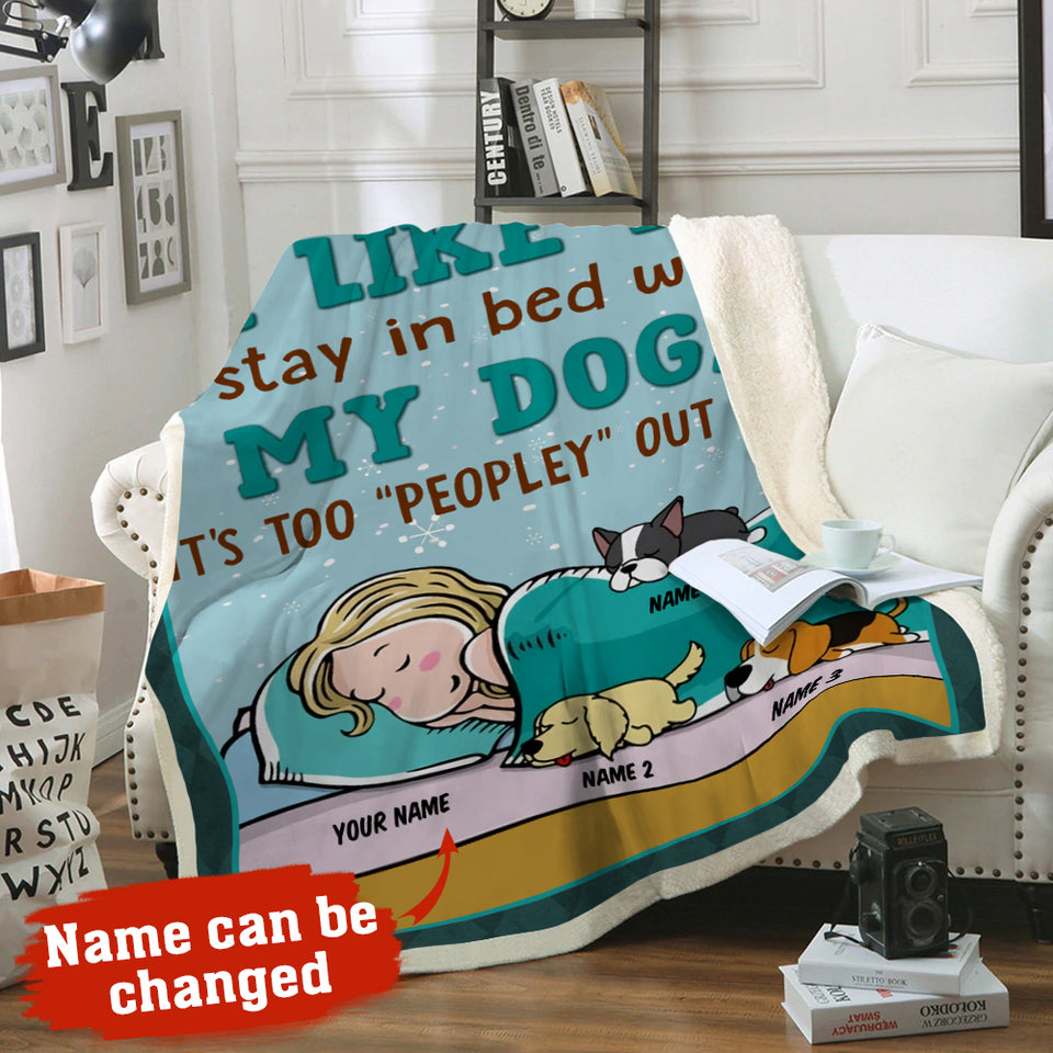 I Like My Dogs custom dog lover fleece blanket spread over a couch for cozy home decor.