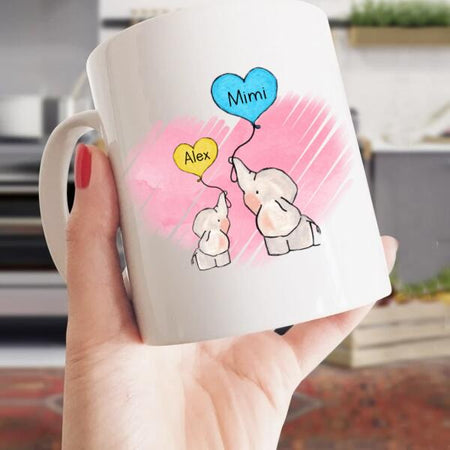 Personalized white ceramic mug featuring a beloved elephant design for family and wildlife lovers.